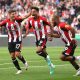 Brentford's Kevin Schade (centre)