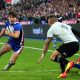 Antoine Dupont of France in action against Aaron Smith of New Zealand