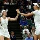 Elise Mertens (R) of Belgium and Storm Sanders (L) of Australia in action