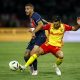 Lucas Hernandez of PSG (L) in action against Adrien Thomasson of Lens