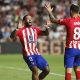 Atletico Madrid's Memphis Depay (L)