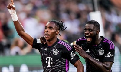 Munich's Mathys Tel (L) celebrates with Munich's Dayot Upamecano