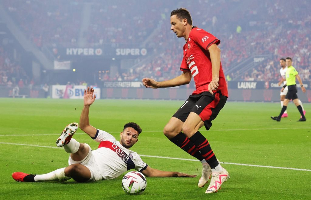 Paris Saint Germain's Goncalo Ramos (L) and Rennes's Nemaja Matic (R)