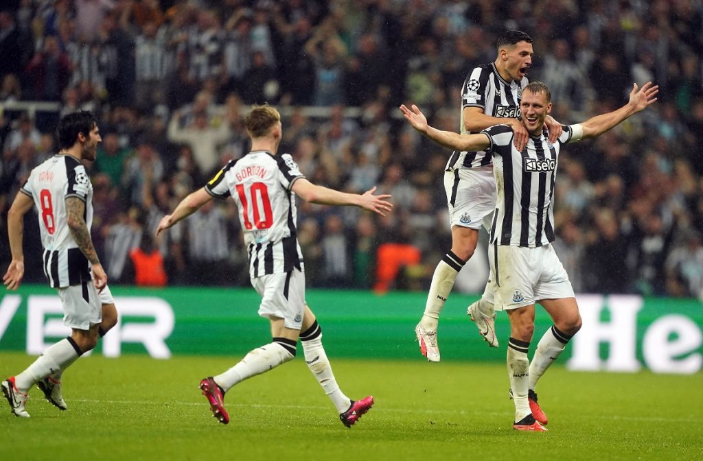 Newcastle United's Dan Burn celebrates scoring
