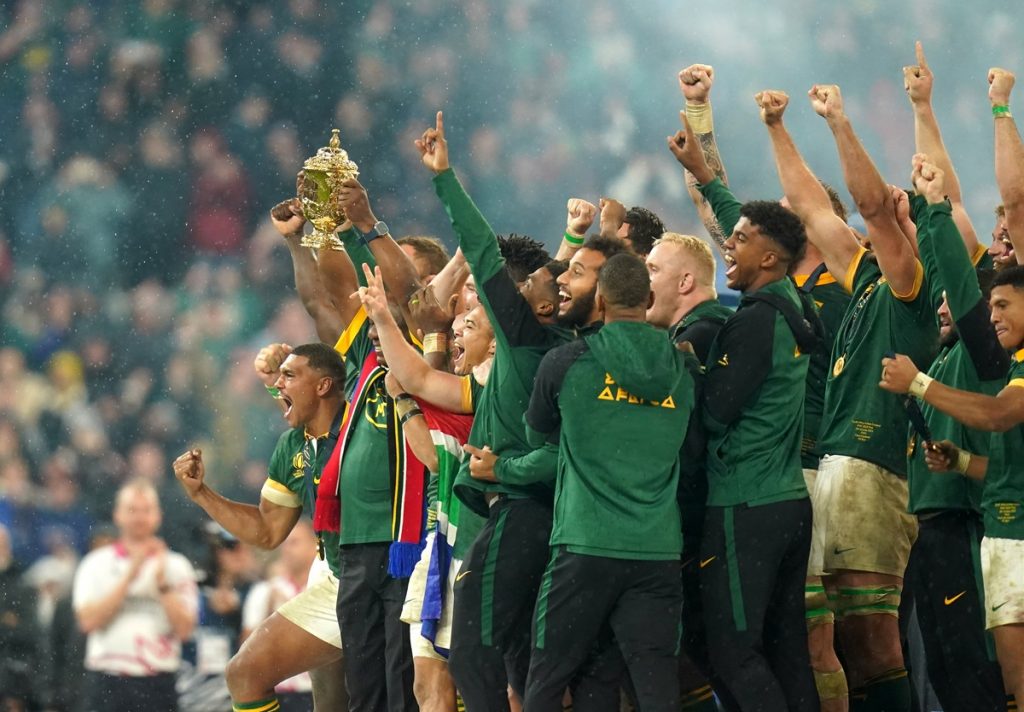 South Africa players celebrate with The Webb Ellis Cup