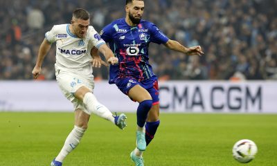 Jordan Veretout (L) of Olympique Marseille and Nabil Bentaleb (R) of Lille