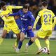 Getafe's defender Diego Rico (C) in action against Cadiz's striker Chris Ramos (L) and midfielder Robert Navarro (R)