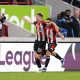 Nathan Collins and Neal Maupay of Brentford