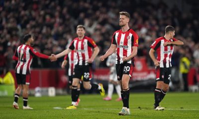 Brentford players celebrate after scoring against Manchester United