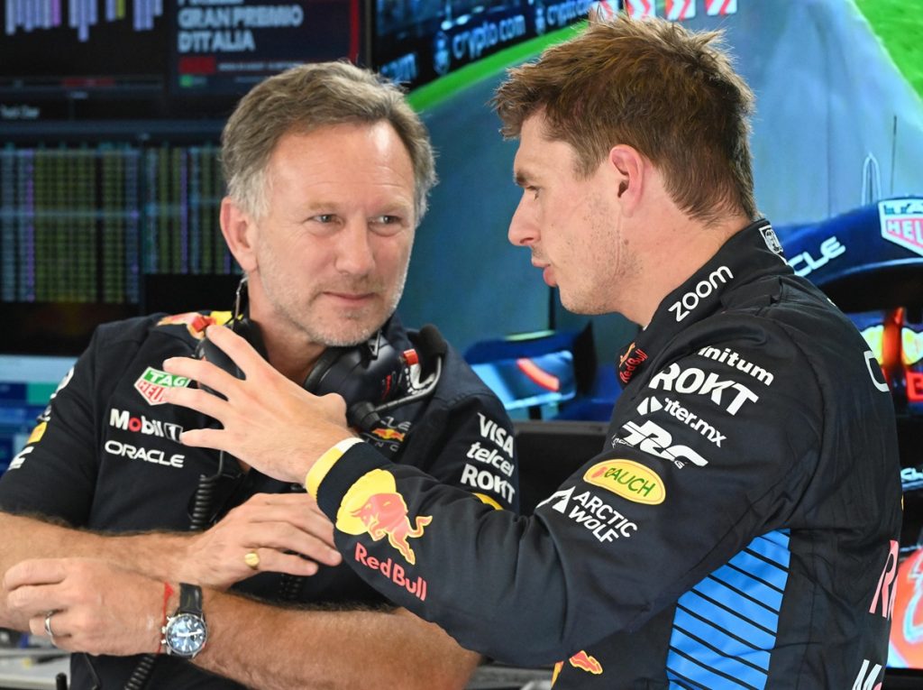 epa11573343 Red Bull Racing team principal Christian Horner (L) and driver Max Verstappen of Netherlands (R) talk during the first practice session for the Formula One Grand Prix of Italy, in Monza, Italy,