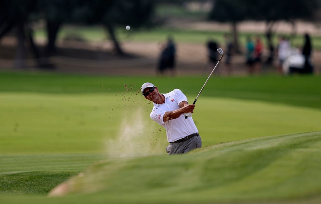 epa11828488 Adam Scott of Australia hits a bunker shot during the first round of the 2025 Dubai Desert Classic golf tournament in Dubai, United Arab Emirates, 16 January 2025. EPA/ALI HAIDER