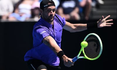 epa11822643 Matteo Berrettini of Italy in action against Cameron Norrie of Great Britain during the Men's Singles first round match at the Australian Open tennis tournament in Melbourne, Australia, 14 January 2025. EPA/JOEL CARRETT AUSTRALIA AND NEW ZEALAND OUT