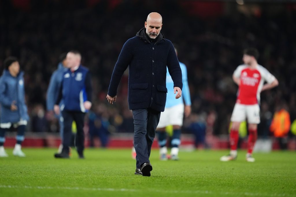 Manchester City manager Pep Guardiola stands dejected after the Premier League match at the Emirates Stadium, London. Picture date: Sunday February 2, 2025.