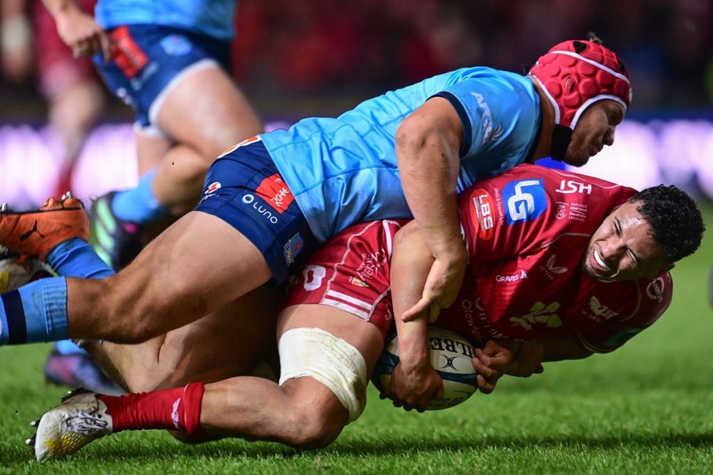 Mandatory Credit: Photo by Ashley Crowden/INPHO/Shutterstock/BackpagePix (13744210az) Scarlets vs Vodacom Bulls. Dan Davis of Scarlets is tackled by Johann Grobbelaar of Vodacom Bulls BKT United Rugby Championship, Parc y Scarlets, Wales - 27 Jan 2023