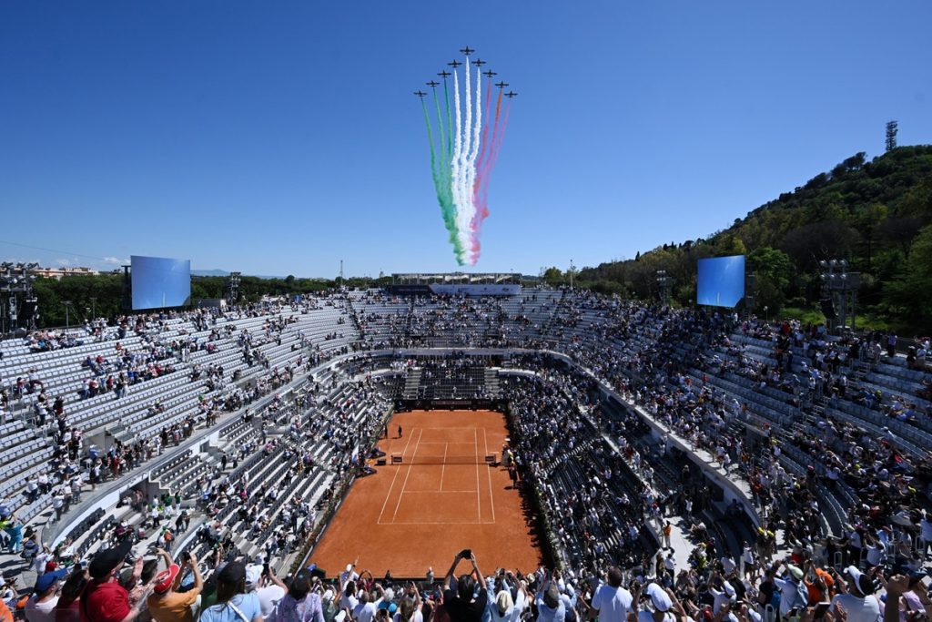 epa11347927 The Italian Air Force aerobatics team, the Frecce Tricolori (lit.Tricolour Arrows), perform a fly-by over the Foro Italico during the Italian Open tennis tournament in Rome, Italy, 17 May 2024. EPA/ETTORE FERRARI