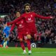 Mo Salah of Liverpool celebrates after scoring agianst Manchester City