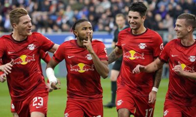 epa10287850 Leipzig's Christopher Nkunku (2-L) celebrates with teammates after scoring the 1-0 lead during the German Bundesliga soccer match between TSG 1899 Hoffenheim and RB Leipzig in Sinsheim, Germany, 05 November 2022. EPA/RONALD WITTEK CONDITIONS - ATTENTION: The DFL regulations prohibit any use of photographs as image sequences and/or quasi-video.