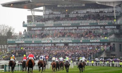 Runners and riders pass the grandstand in the William Hill Handicap Hurdle during day two of the Randox Grand National Festival at Aintree Racecourse, Liverpool. Picture date: Friday April 14, 2023.