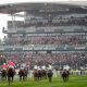 Runners and riders pass the grandstand in the William Hill Handicap Hurdle during day two of the Randox Grand National Festival at Aintree Racecourse, Liverpool. Picture date: Friday April 14, 2023.