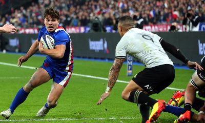 Antoine Dupont of France in action against Aaron Smith of New Zealand