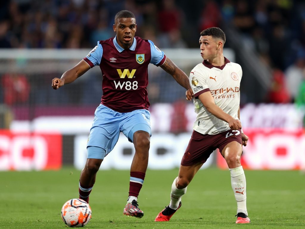 Burnley's Lyle Foster (left) and Manchester City's Phil Foden