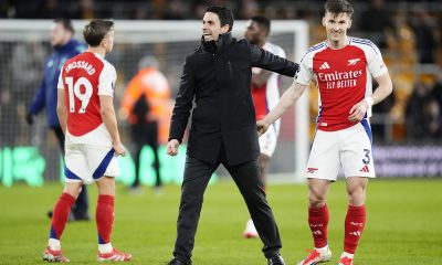 Arsenal manager Mikel Arteta (centre) and Kieran Tierney after the Premier League match at Molineux Stadium, Wolverhampton.