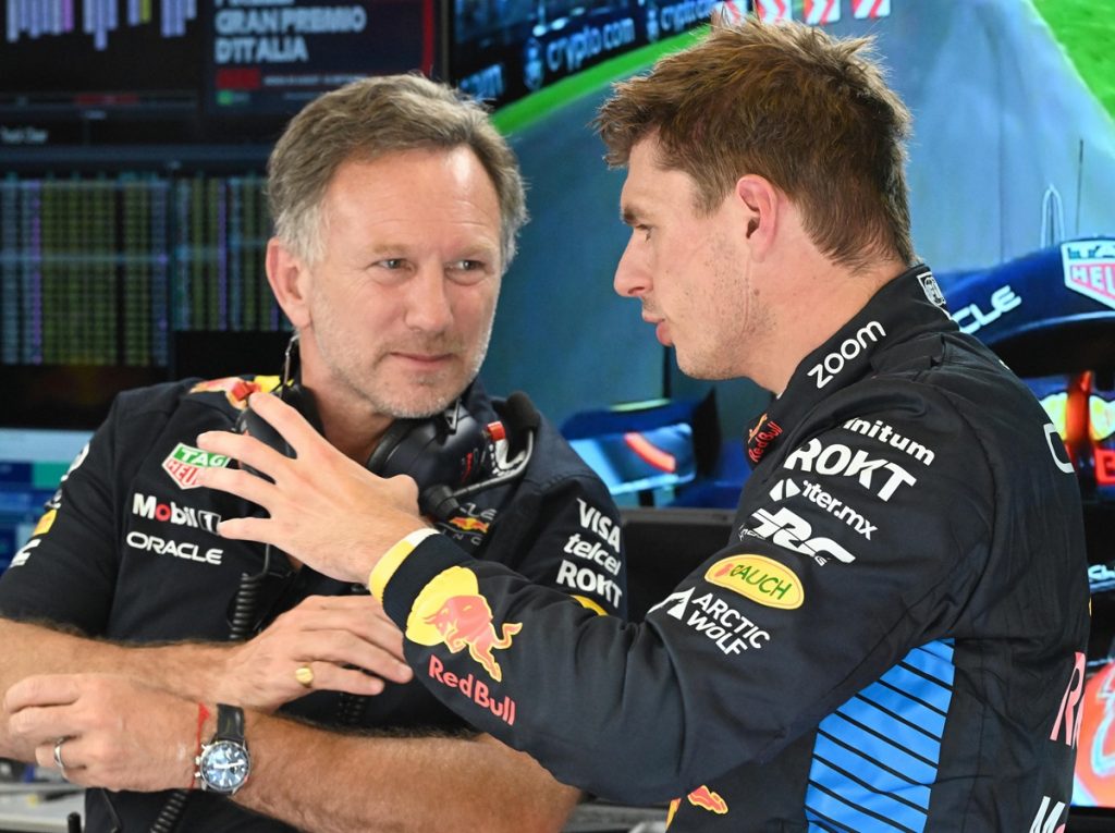 epa11573343 Red Bull Racing team principal Christian Horner (L) and driver Max Verstappen of Netherlands (R) talk during the first practice session for the Formula One Grand Prix of Italy, in Monza, Italy,