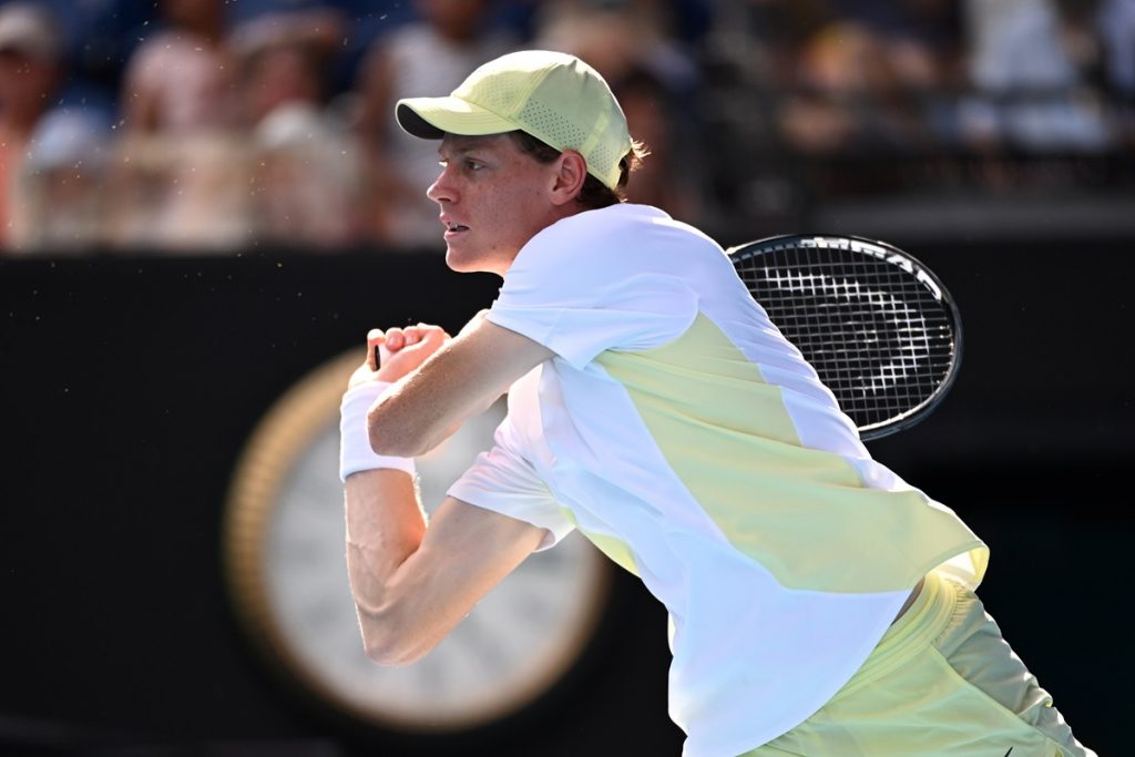 epa11837746 Jannik Sinner of Italy in action during his round 4 match against Holger Rune of Denmark during the 2025 Australian Open at Melbourne Park in Melbourne,