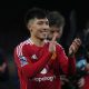 Manchester United's Lisandro Martinez celebrates with the crowd after the Premier League match at Craven Cottage, London.