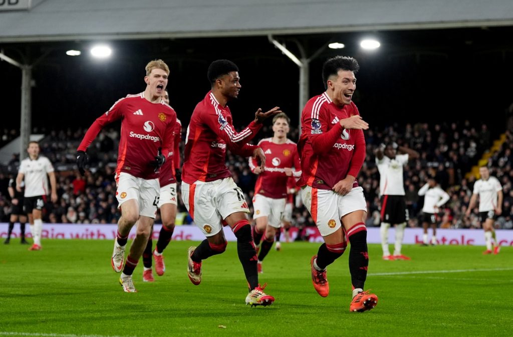 Manchester United's Lisandro Martinez celebrates scoring their side's first goal of the game during the Premier League match at Craven Cottage, London. Picture date: Sunday January 26, 2025.