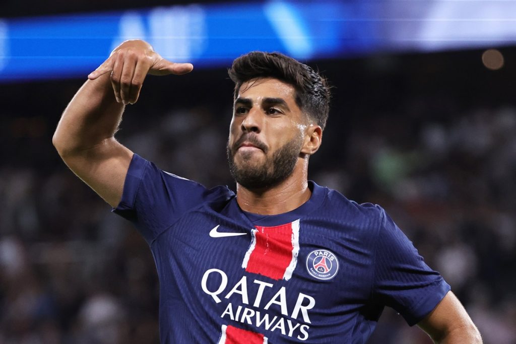 epa11562039 Paris Saint Germain's Marco Asensio celebrates scoring the 2-0 lead during the French Ligue 1 soccer match between Paris Saint Germain and Montpellier HSC at Parc des Princes Stadium in Paris, France, 23 August 2024. EPA/CHRISTOPHE PETIT TESSON