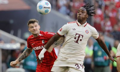 epa11577884 Mathys Tel of Munich (R) in action against Lukas Kuebler of Freiburg (L) during the German Bundesliga soccer match between FC Bayern Munich and SC Freiburg, in Munich, Germany, 01 September 2024. EPA/RONALD WITTEK CONDITIONS - ATTENTION: The DFL regulations prohibit any use of photographs as image sequences and/or quasi-video.