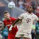 epa11577884 Mathys Tel of Munich (R) in action against Lukas Kuebler of Freiburg (L) during the German Bundesliga soccer match between FC Bayern Munich and SC Freiburg, in Munich, Germany, 01 September 2024. EPA/RONALD WITTEK CONDITIONS - ATTENTION: The DFL regulations prohibit any use of photographs as image sequences and/or quasi-video.