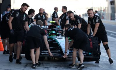 epa11767711 Mechanics push the car of Mercedes' young driver Frederik Vesti of Denmark during the Formula One post-season test session at the Yas Marina Circuit racetrack in Abu Dhabi, United Arab Emirates,