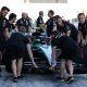 epa11767711 Mechanics push the car of Mercedes' young driver Frederik Vesti of Denmark during the Formula One post-season test session at the Yas Marina Circuit racetrack in Abu Dhabi, United Arab Emirates,