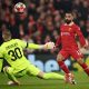 epa11843004 Mohamed Salah of Liverpool (R) scores the 1-0 opening goal during the UEFA Champions League league phase match between Liverpool FC and LOSC Lille, in Liverpool,