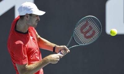 epa11822907 Hubert Hurkacz of Poland in action against Tallon Griekspoor of the Netherlands during their Men's first round match during the Australian Open tennis tournament in Melbourne, Australia, 14 January 2025. EPA/ROLEX DELA PENA