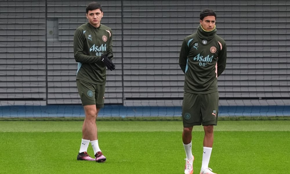 Manchester City's Vitor Reis (left) and Vitor Reis during a training session at the City Football Academy, Manchester