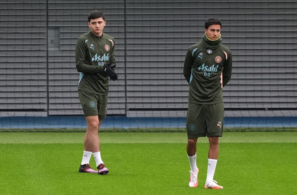 Manchester City's Vitor Reis (left) and Vitor Reis during a training session at the City Football Academy, Manchester