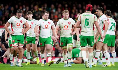 Wales' players show their dejection after conceding a try during the Autumn International match at the Principality Stadium, Cardiff. Picture date: Saturday November 23, 2024.