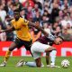 Wolverhampton Wanderers' Yerson Mosquera and Aston Villa's Morgan Rogers battle for the ball during the Premier League match at Villa Park, Birmingham.