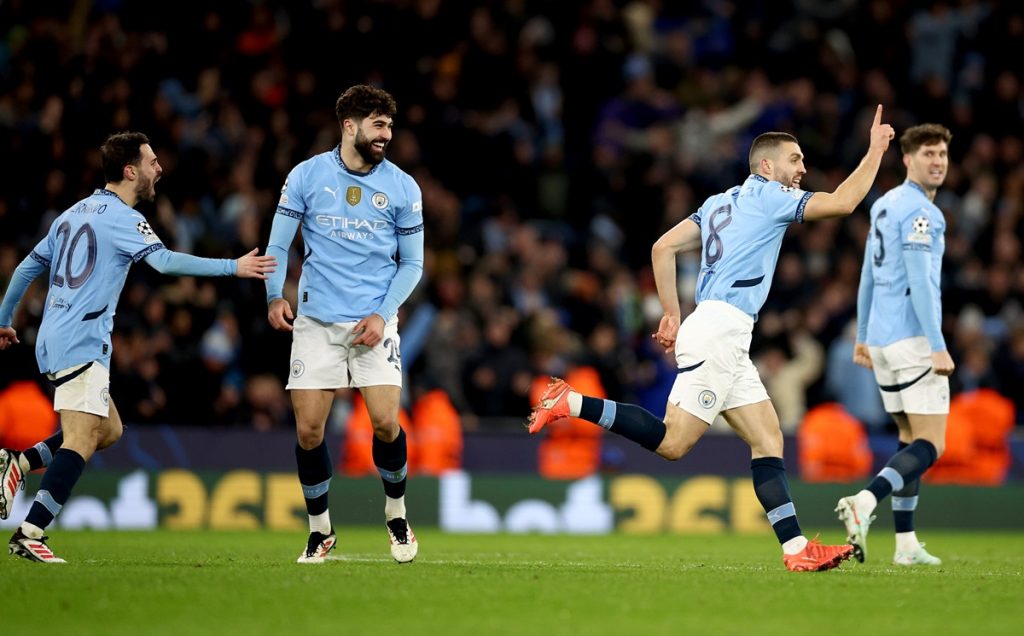 epa11862003 Mateo Kovacic (2R) of Manchester City celebrates after scoring the 1-1 during the UEFA Champions League match between Manchester City and Club Brugge in Manchester, Britain, 29 January 2025.