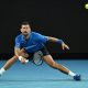 epa11835777 Novak Djokovic of Serbia plays a shot during the Men's Singles round four match against Jiri Lehecka of the Czech Republic at the Australian Open tennis tournament in Melbourne, Australia, 19 January 2025. EPA/JAMES ROSS AUSTRALIA AND NEW ZEALAND OUT