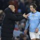 epa11757308 Manchester City's manager Pep Guardiola (L) speaks with his player Jack Grealish during the English Premier League soccer match between Manchester City and Nottingham Forest, in Manchester, Britain, 04 December 2024. EPA/ADAM VAUGHAN EDITORIAL USE ONLY