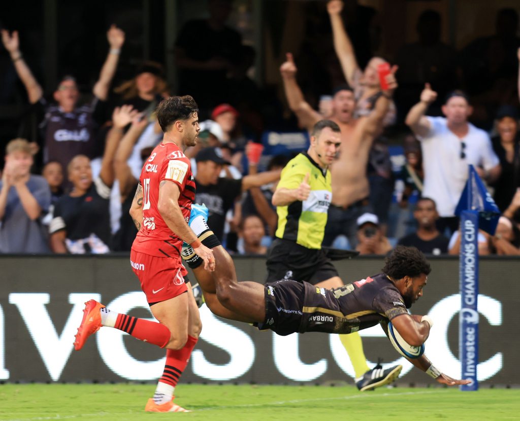 Jurenzo Julies of the Sharks score a try during the Investec European Rugby Championships Cup 2024/25 match between Sharks and Stade Toulousain at Kings Park Stadium in Durban on 11 January 2025