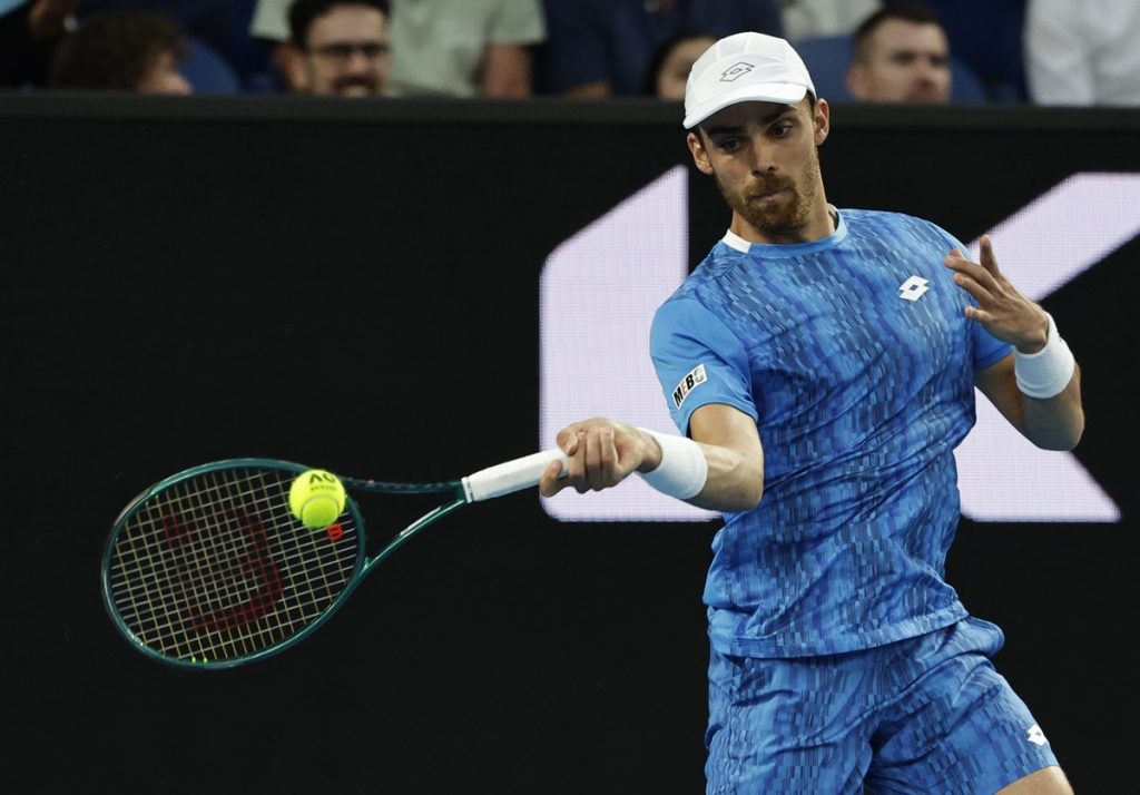 epa11830222 Benjamin Bonzi of France in action during the Men's Singles round 3 match against Jiri Ledecka of Czechia at the Australian Open Grand Slam tennis tournament in Melbourne, Australia, 17 January 2025. EPA/ROLEX DELA PENA