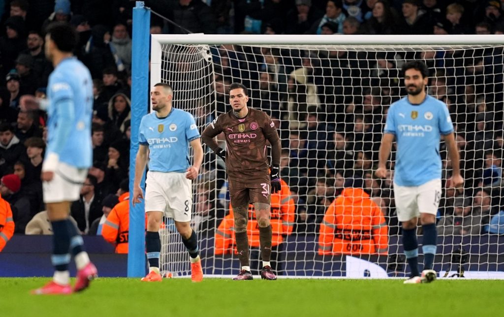 Manchester City goalkeeper Ederson and team-mates react after they concede a second goal during the UEFA Champions League Knockout Phase Play Offs, first leg match at the Etihad Stadium, Manchester. Picture date: Tuesday February 11, 2025.