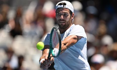 epa11832333 Karen Khachanov of Russia in action against Alex Michelsen of the US during their round three match during the 2025 Australian Open at Melbourne Park in Melbourne, Australia, 18 January 2025. EPA/LUKAS COCH AUSTRALIA AND NEW ZEALAND OUT