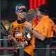 epa11764934 McLaren Racing CEO Zak Brown and his driver Lando Norris of Britain celebrate on the podium after the Formula One Abu Dhabi Grand Prix, at the Yas Marina Circuit racetrack in Abu Dhabi, United Arab Emirates, 08 December 2024. EPA/ALI HAIDER