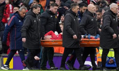 Manchester United's Lisandro Martinez leaves the pitch on a stretcher after going down injured during the Premier League match at Old Trafford, Manchester. Picture date: Sunday February 2, 2025.